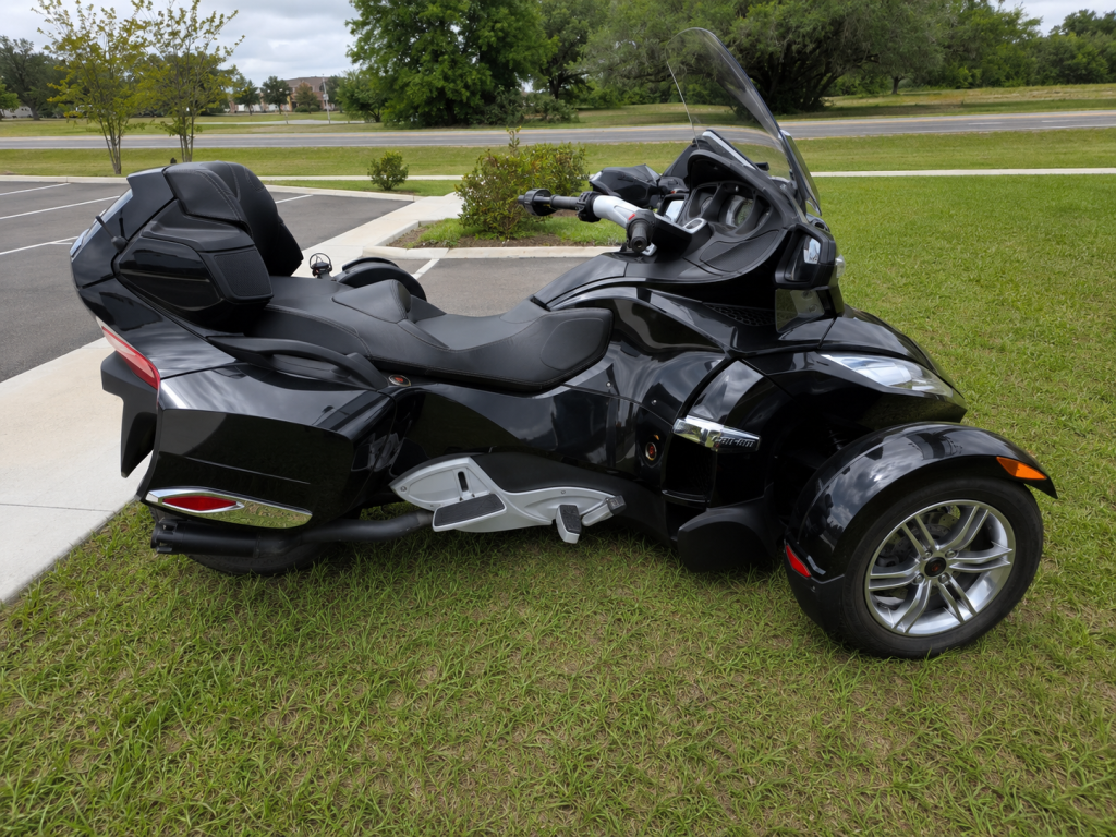 Sleek black Can-Am Spyder trike